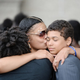 Mourners embrace before services for Philando Castile in St. Paul, Minn., on Thursday. (Credit: St. Paul Pioneer Press)